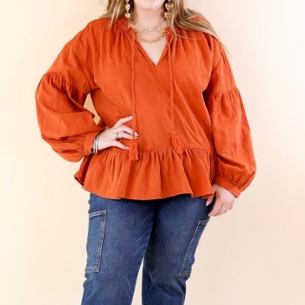 Textured Long sleeve peplum top